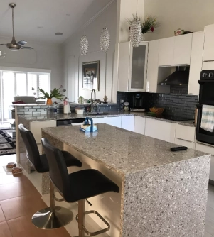Beautiful and clean kitchen with central table